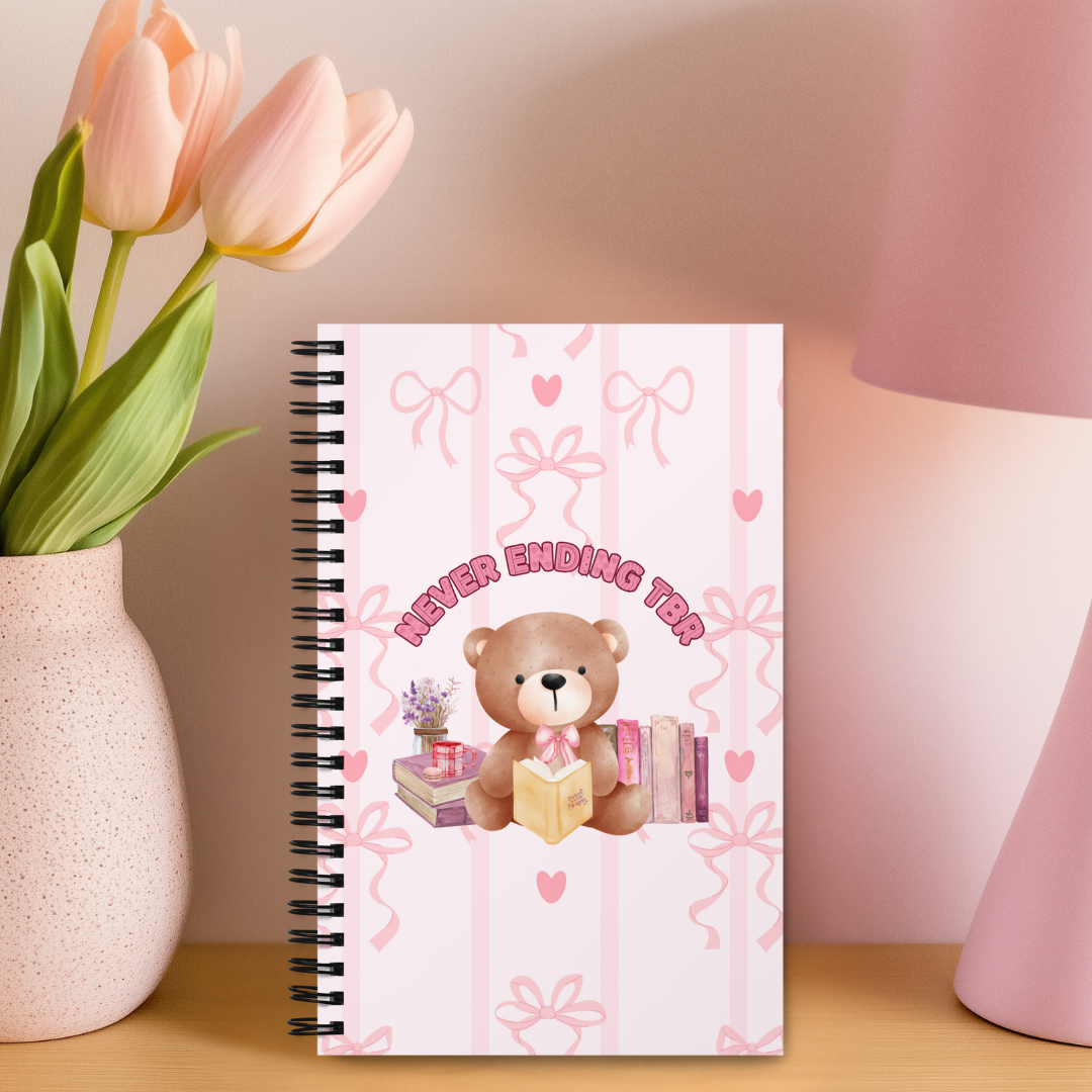 notebook with text never ending tbr reading journal