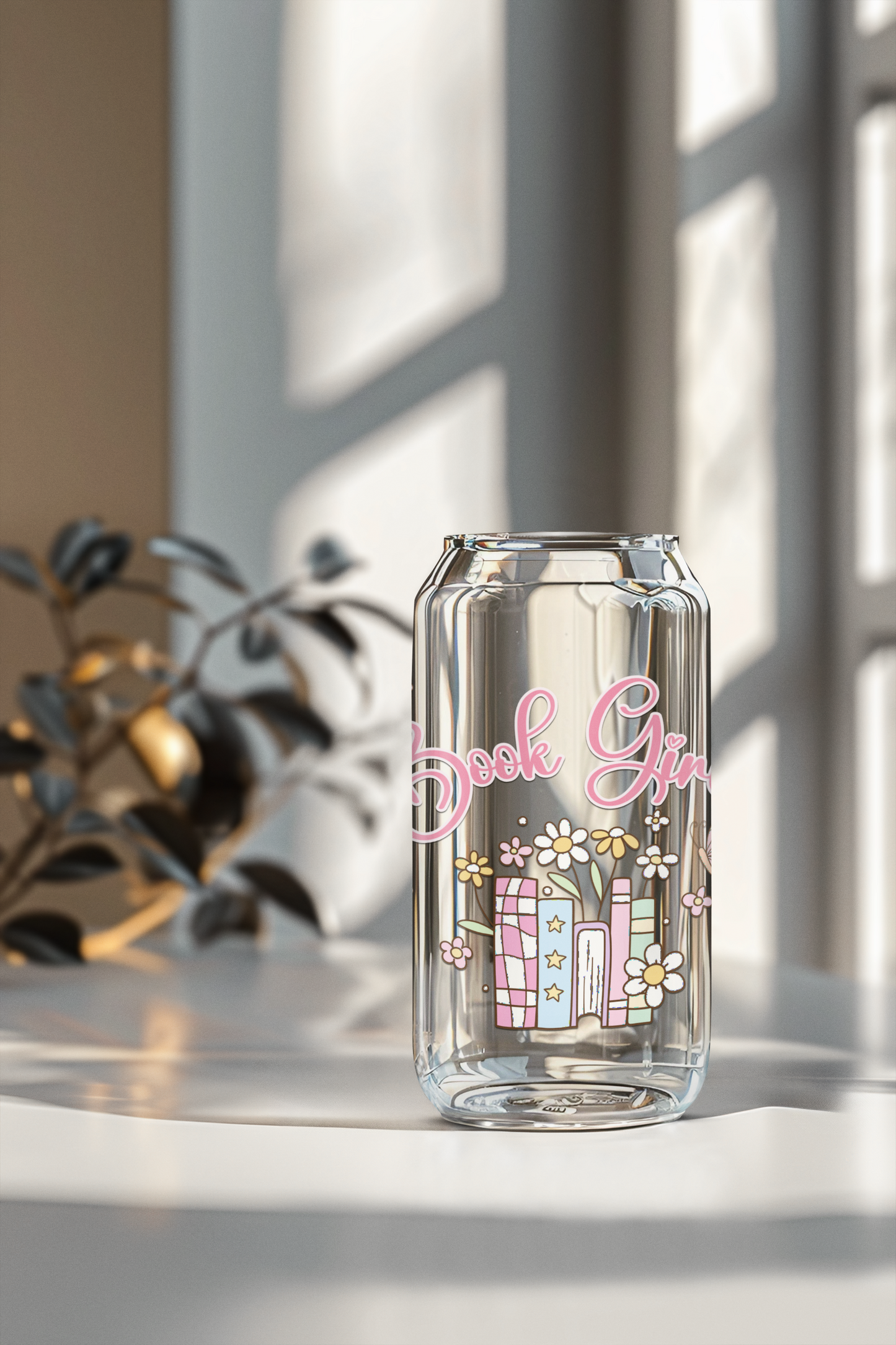 bookish glassware with books and flowers
