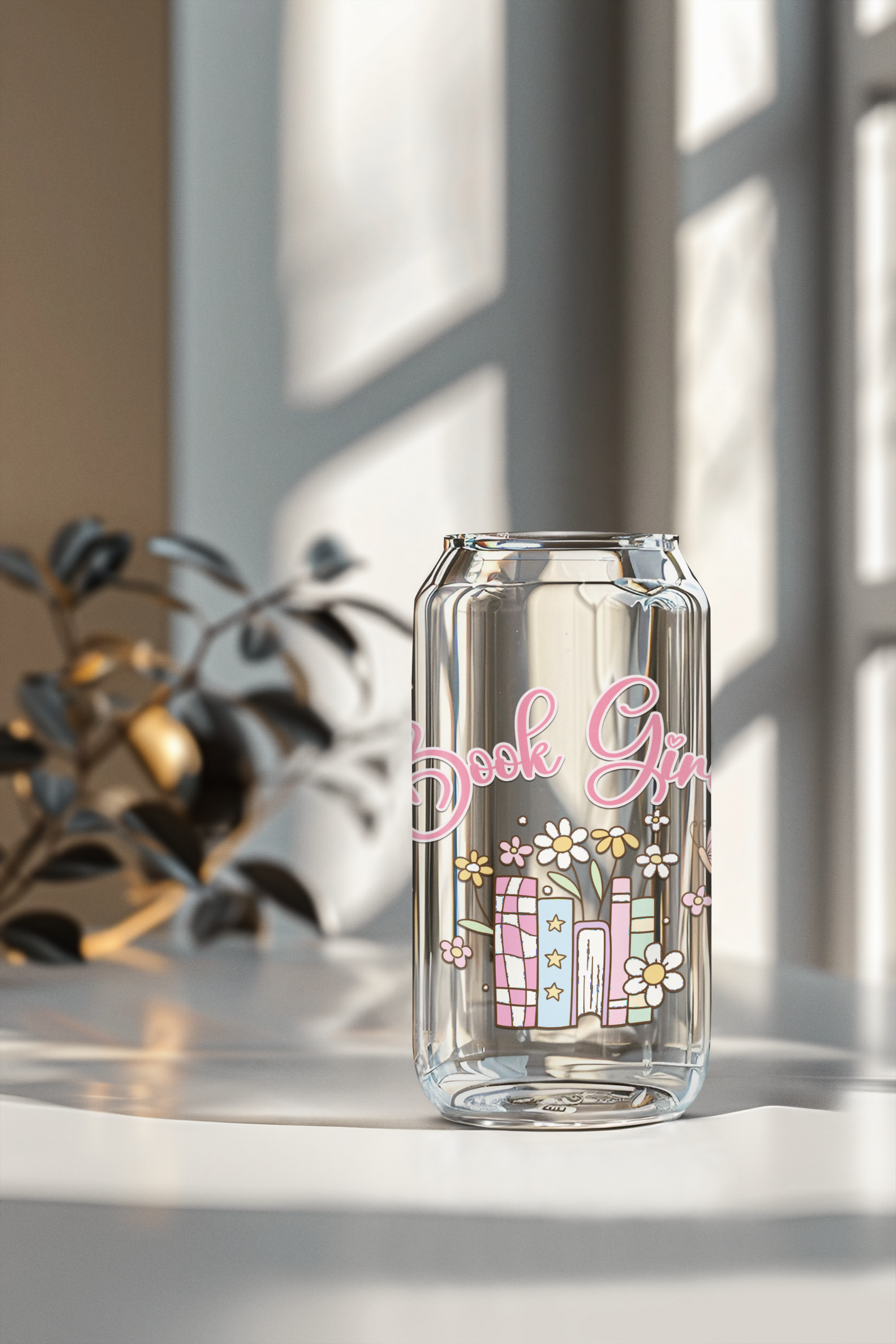 bookish glassware with books and flowers